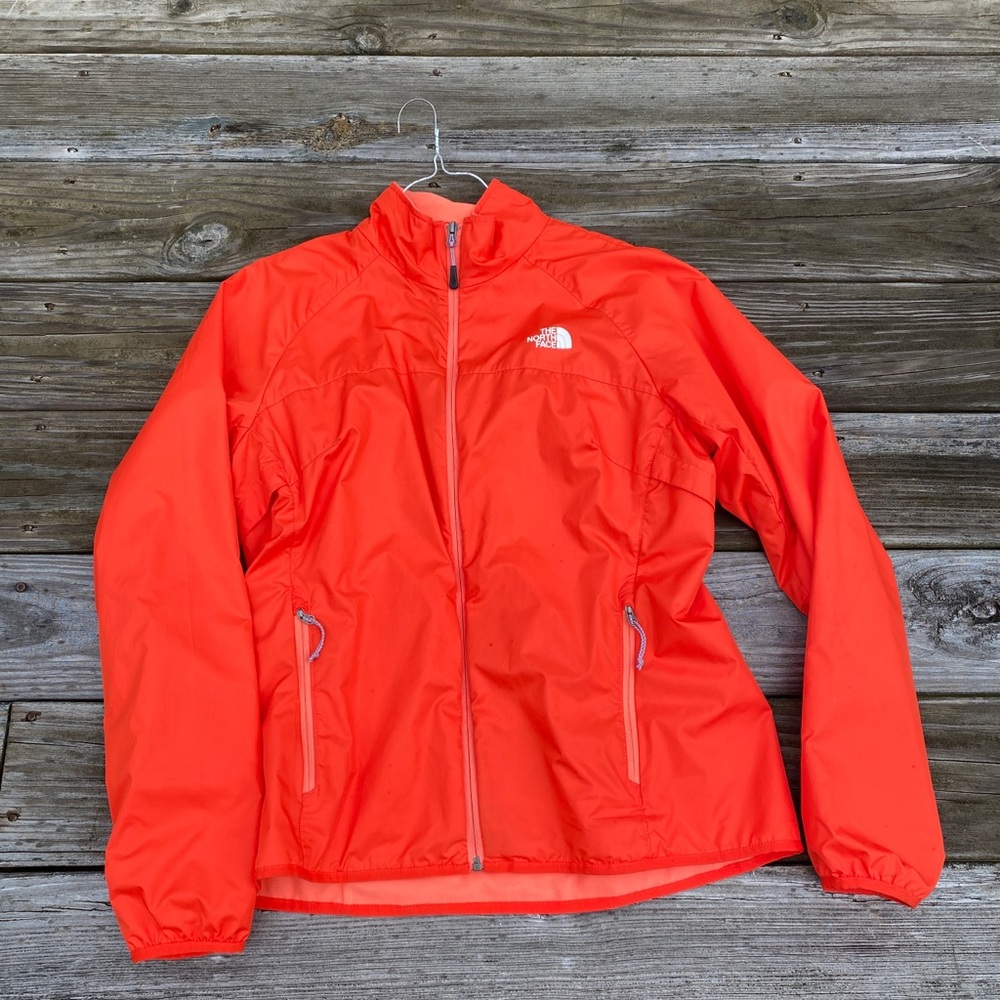 The North Face orange jacket